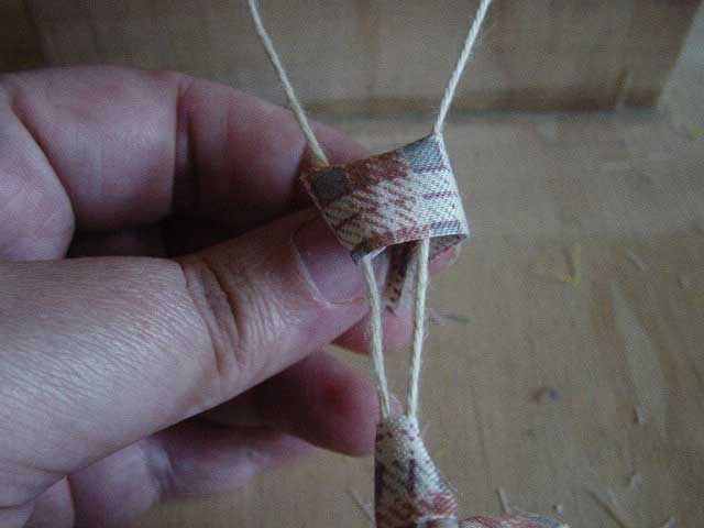 How to make a ghiordes knot step 2