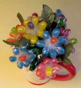 Jelly bean flowers in a santa claus mug