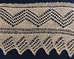 Three repeats of herringbone lace from Home Work. Published in 1891.