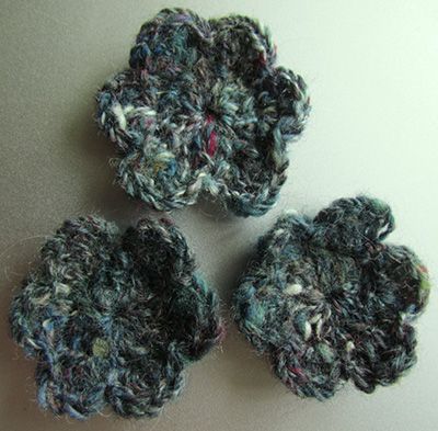 Crochet flowers made from a scrap of handspun wool/silk