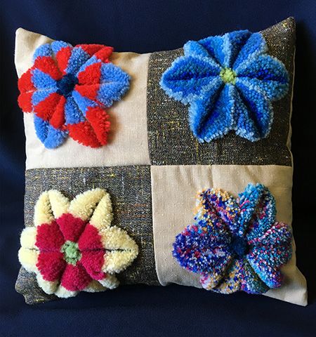 Plushwork embroidered cushion