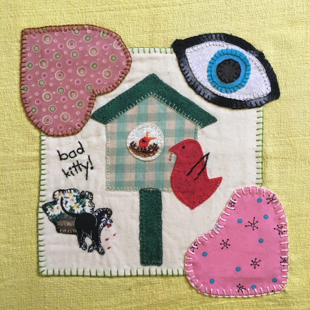 Applique sampler with found fabrics