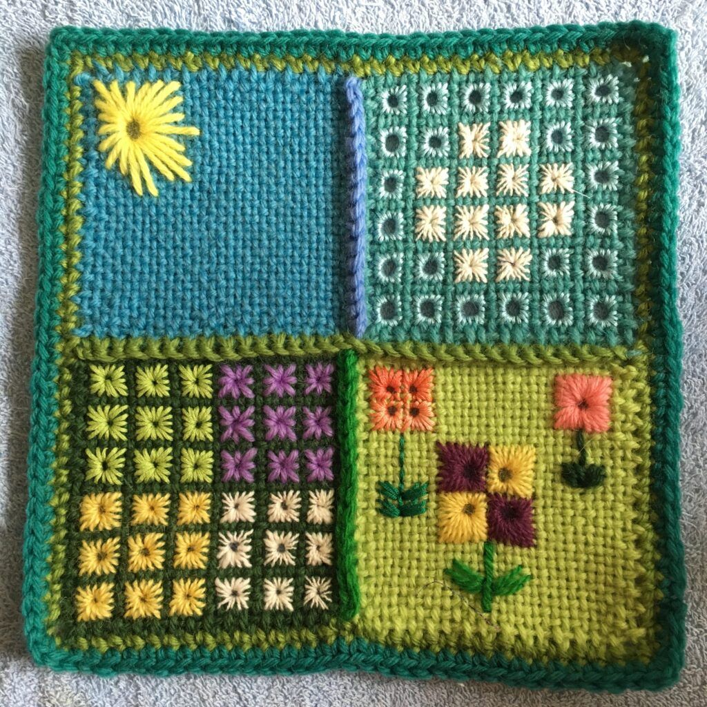 An embroidered garden worked in Algerian eye stitch on pin loom squares. Four 4 inch squares are crocheted together to form an 8 inch sampler.