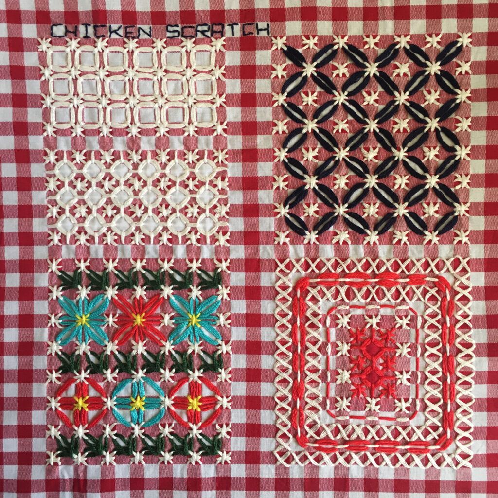 Chicken scratch embroidery on red gingham
