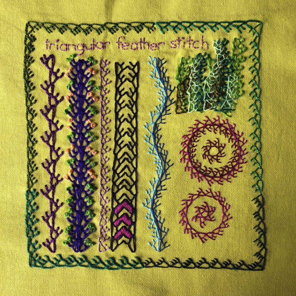 Triangular feather stitch embroidery sampler showing borders and layering.