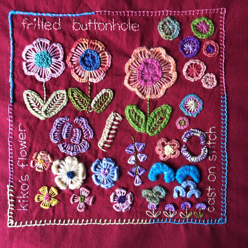 Embroidery sampler featuring lots of different flowers