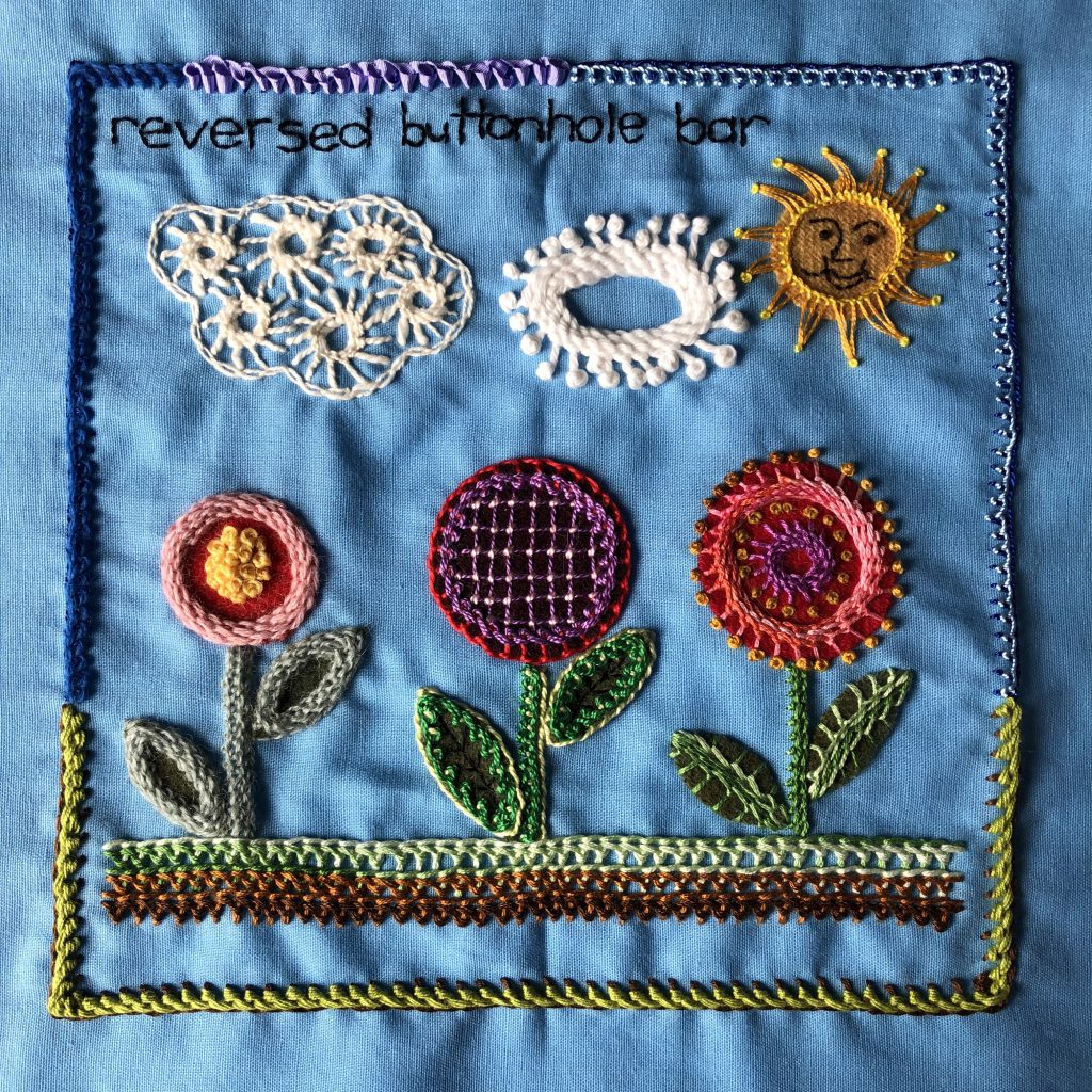 Garden scene embroidery sampler worked in reversed buttonhole bar stitch.