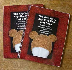 Two printed copies of the Any Yarn, Any Size Knit Hat Book