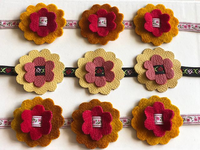 Finished flower trims made from felt, leather and ribbon