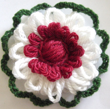 Finished reversible loomed flower