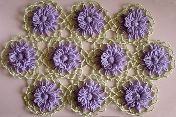 Loomed flowers joined together with crochet