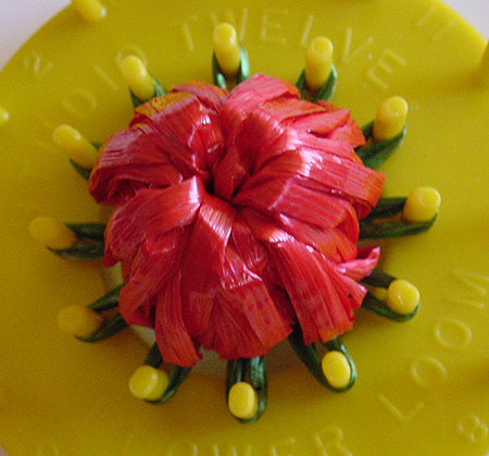 Making a strawberry on a flower loom