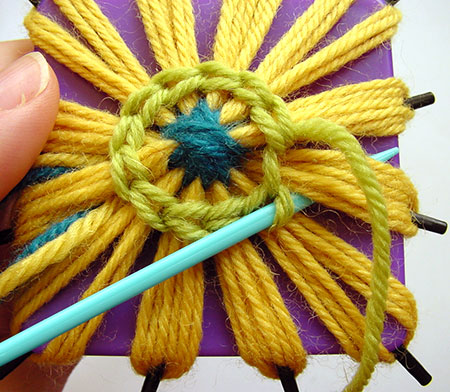 Finishing the last chain stitch on your flower