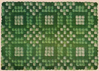 Green geometric pom pom rug