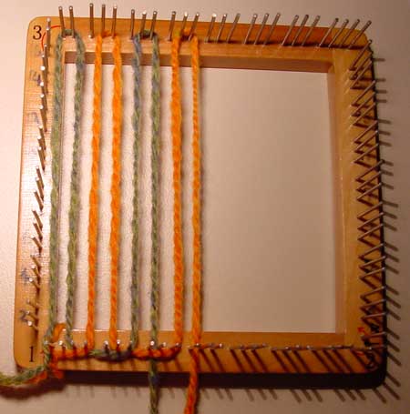Laying the warp with two colours