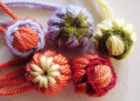 A collection of loomed flower buds