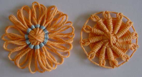 Yarn flowers with back stitch centers