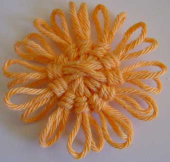 The completed flower off the loom