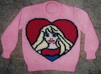 Pink sweater with Barbie doll knit on the front