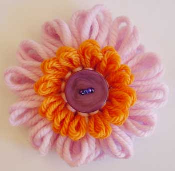 Loomed flower with a button center