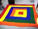 rainbow colored butterfly loom rug