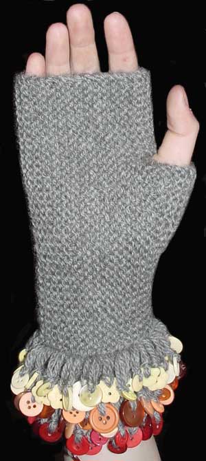 Garter sttich fingerless mitts with buttoned fringe