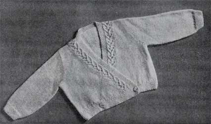 Knitted baby cardigan sweater with lace border