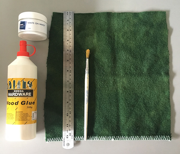 Glue, coloured wool blanket, ruler, paint and paint brush