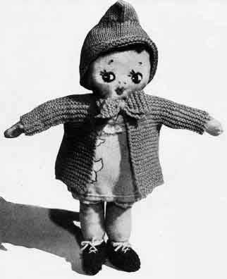 Rag doll with knitted coat and bonnet