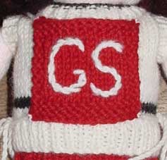 Knitted netball bib for dolls