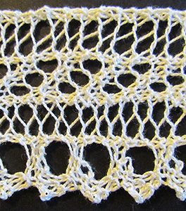 Knitted edging with eyelet lace scallops
