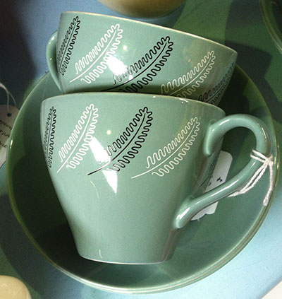 Mid century modern mugs with feather design