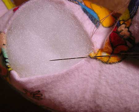 Taking a stitch from the opposite side
