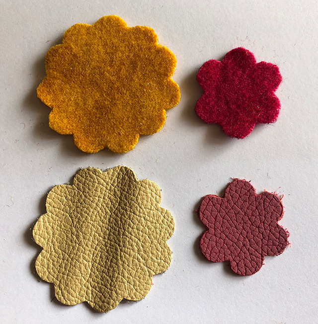 Flower shapes cut from boiled wool felt and leather