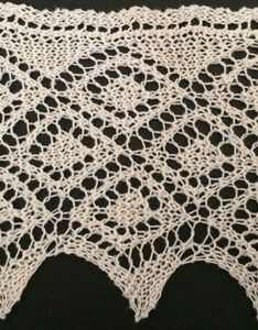 Lace knit edging with triple row of double diamond motifs