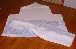 Knitted baby towel laid flat