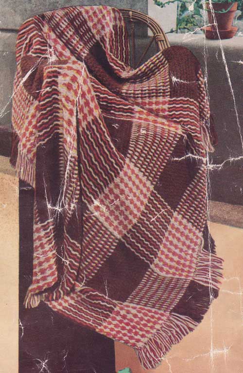 crochet afghan blanket with a plaid tartan design