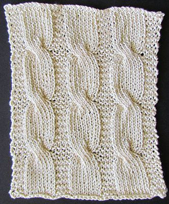 Cabled knit blanket panel knit from a Victorian era knitting pattern.