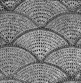 Knitted motifs in a shell shape for making bedspreads