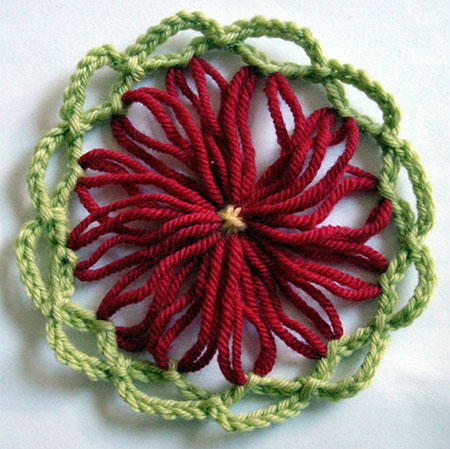 Large loomed flower wth crochet border