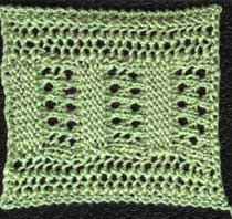 Knitted lace insertion with geometric design