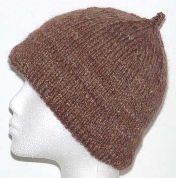 Hand kit beanie with a folded up hem.