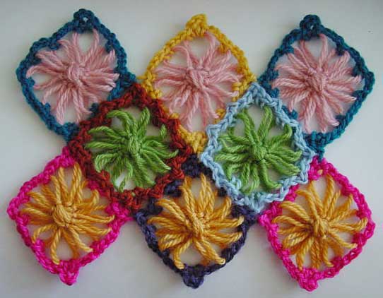 Diamond flower loom motifs with multi-color crochet edging 