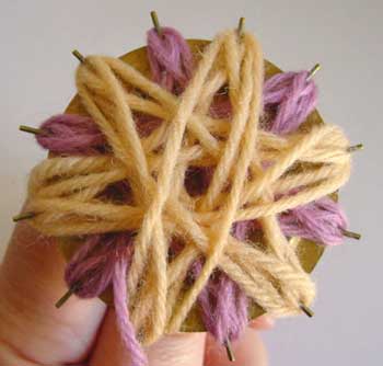 Winding a flower on a loom