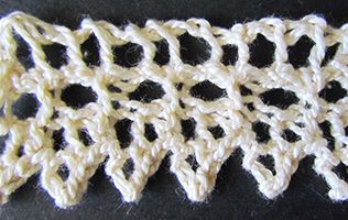 Tiny lace knit edging knitted from a Victorian era knitting pattern