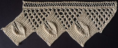 Wide knitted leaf edging for a bedspread or counterpane