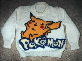 White sweater with Pikachu the Pokemon knit on the front