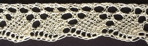 Narrow shell lace edging with eyelet triangles