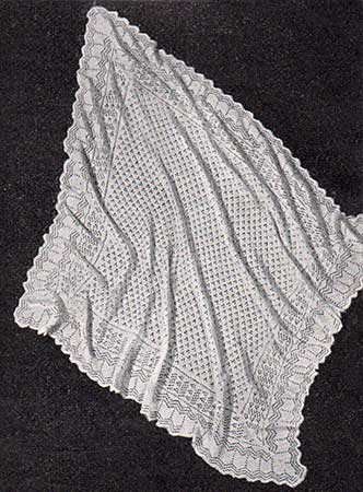 shetland baby shawl with dotted lace centre and wave patterned border