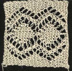 Knitted lace insertion with diamond pattern